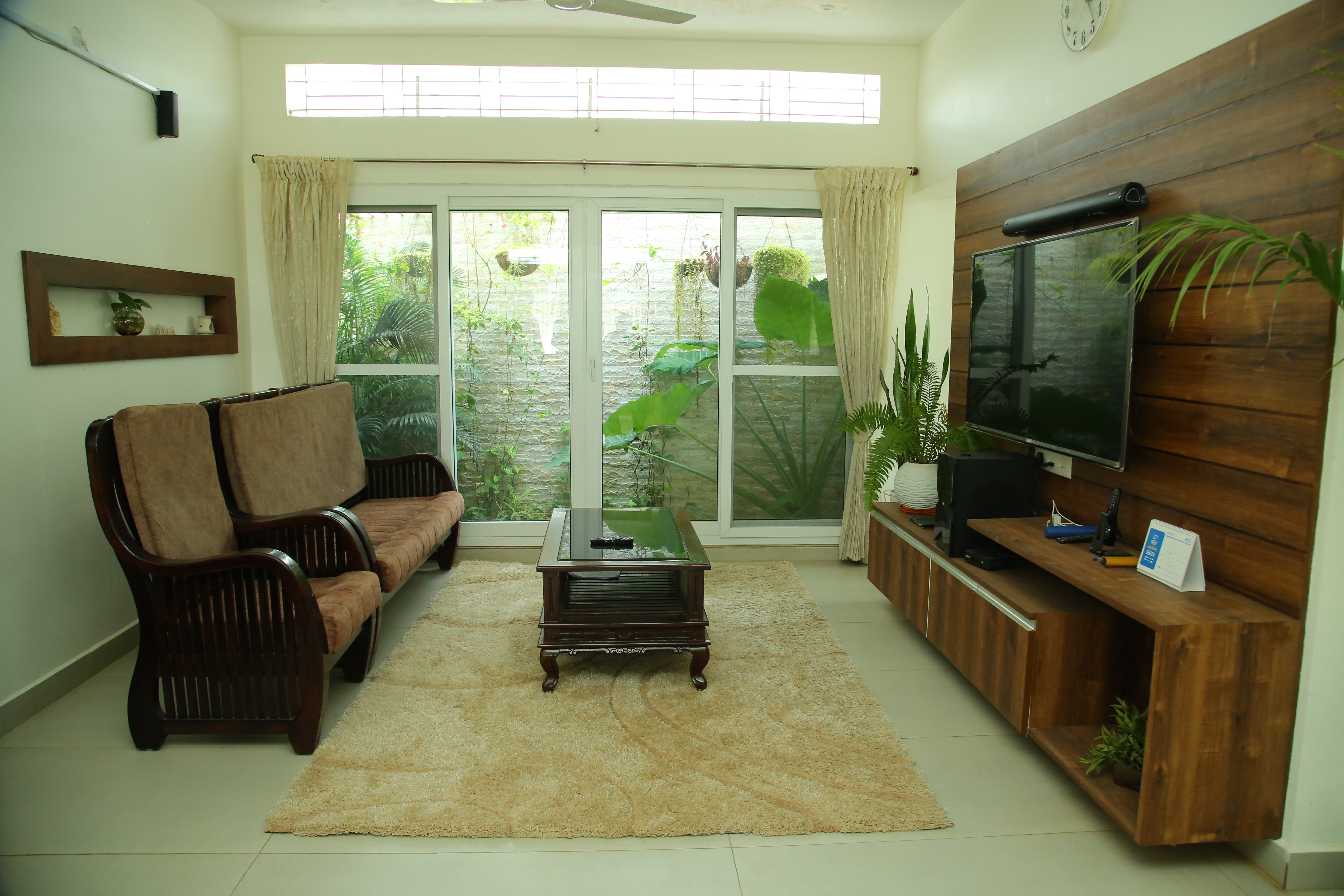 Sustainable house exterior with landscape in Theni